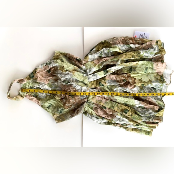 ASOS DESIGN Halter mini dress with bow back in floral print - Picture 8 of 14